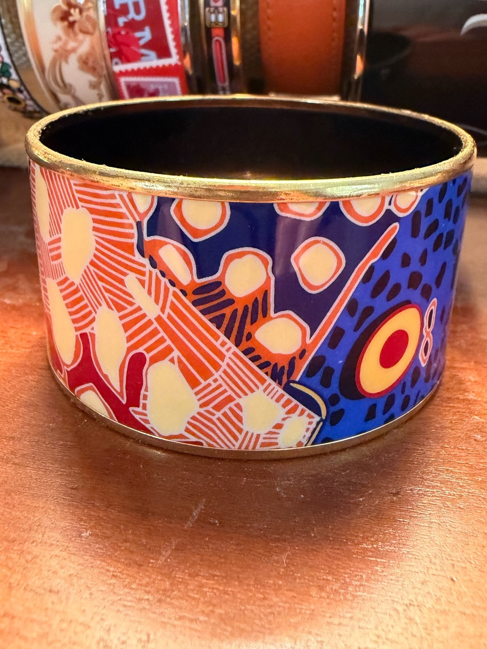 Hermes enamel bangle - Orange & Blue abstract, 2.5-inch diameter.